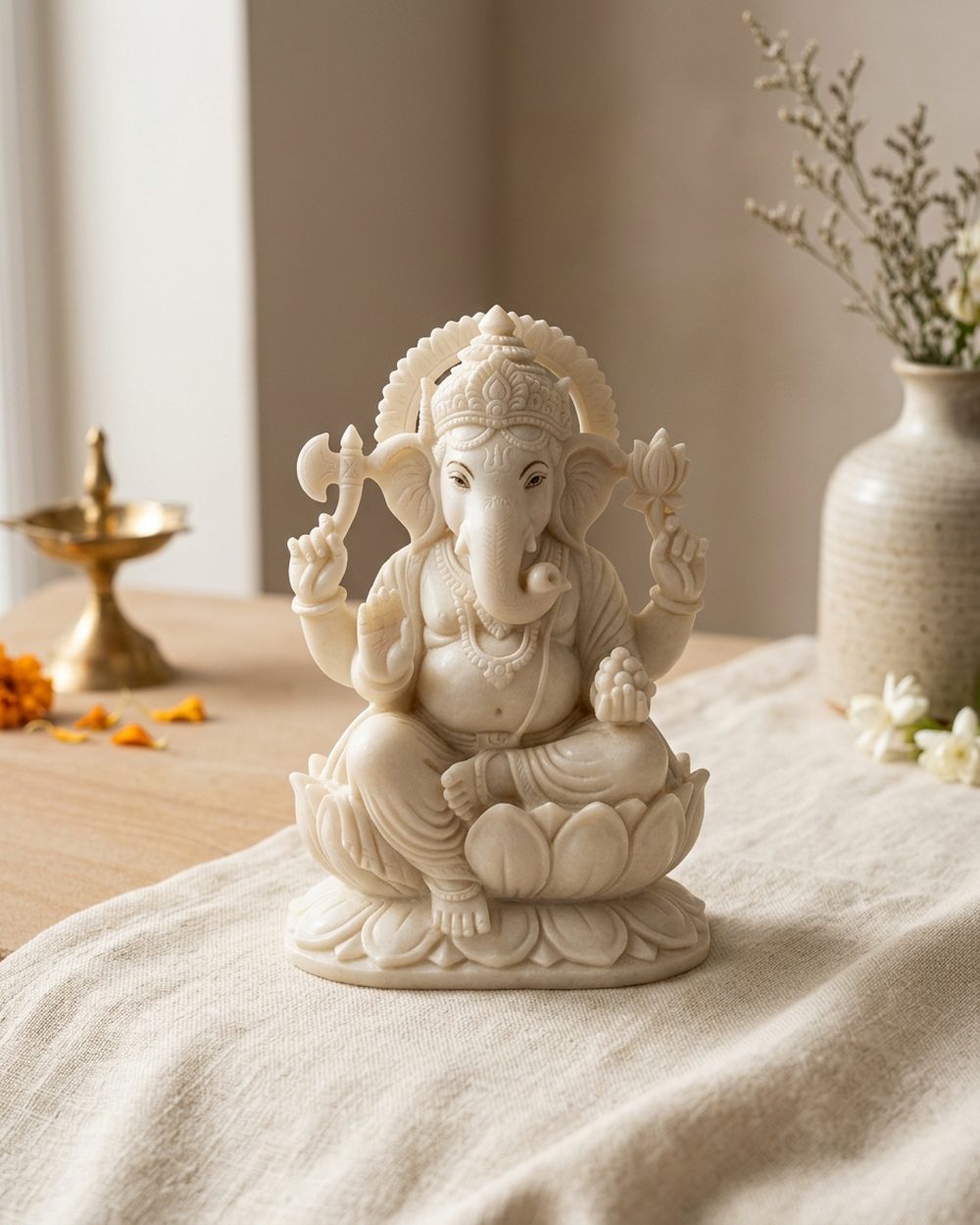 Hand-carved white Makrana marble Ganesha idol with fine detailing